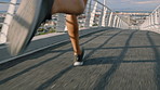 Fitness, sweat or legs on bridge with running, cardio or stamina exercise in speed activity. Fast, sports hobby or person with intense sprint, physical performance or endurance workout in city.