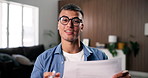 Businessman, face and video call with documents in home for finance consultation or online advice. Portrait, man or consultant with smile, glasses or paper in POV for insurance or virtual assistance