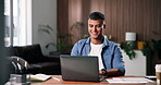 Laptop, reading and man with smile for remote work in home, data entry and update records for bookkeeping. Review, info maintenance and auditor with pc to verify documents, typing and freelancer