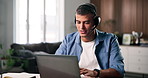 Businessman, agent and laptop with headset in home for online advice or customer service. Man, consultant or talking with mic on computer for virtual assistance, web support or network help in house