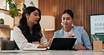 Meeting, business and women with annual report on tablet for financial review, company growth and planning. Collaboration, team and people on tech for finance trends, budget proposal and performance