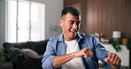 Earphones, smile and man with dancing in home, streaming music playlist and radio song for weekend break. Audio tech, album or happy person listening to track in apartment, groove or moving to rhythm