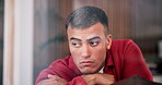 Sad, man and thinking on couch, house and lonely after break up in lounge, memory and mental health. Anxiety, reflection and person with depression, disappointed and heartbroken by toxic relationship