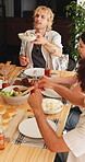 Outdoor, friends and lunch together at house, social gathering and conversation with food on weekend. Happiness, people and reunion with meal on break, home and relax with alcohol or smile for brunch