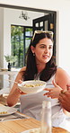 Patio, woman and lunch with friends at house for social gathering, reunion or share food with smile. Home, together and hangout with meal on weekend, happy and people with alcohol for outdoor event