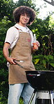 Face, man and barbecue with alcohol in backyard for cooking lunch meal, weekend break or unwind. Relax, happy african person or bbq grill with beer in home garden for birthday brunch, fun and me time