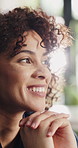 Thinking, smile and woman in home, relax and reflection for memory, daydreaming or comfort. Inspiration, lens flare or person in lounge, happiness or thoughtful with contemplation or positive mindset