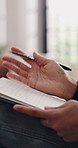 Person, hands and therapist talking with notebook for counseling, advice or therapy session. Counselor, discussion and notes with diary or understanding for consultation, mental wellbeing or healing
