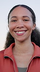 Face, fitness and woman in city, smile and progress for workout routine, wellness and funny. Outdoor, runner and person with training for health benefits, laughing and goals for exercise and rest