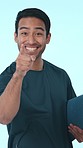 Sign up, fitness and pointing with face of man in studio for gym membership, coach and welcome. Personal trainer registration, volunteer and support with person on blue background for motivation
