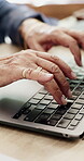 Typing, laptop and senior hands at desk, technology competence and keyboard game for skill development Home, digital activity and person with computer for accuracy challenge, speed test and practice