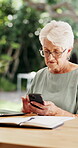Typing, reading and phone with old woman in home for retirement annuity, contact and research. Pension fund review, communication and asset report with senior person in backyard for account policy