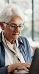 Reading, laptop and senior woman in home, pension payout application and elderly grant registration. Digital banking, pc and old person with online clearance for subsidy, typing and retirement funds