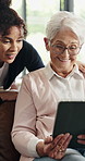 Caregiver, tablet and old woman in nursing home with discussion, help or recommendation for ebook. Nurse, elderly person and talk in retirement center with tech, assistance or browse for online novel