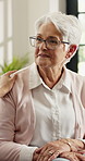 Caregiver, shoulder touch and old woman in home with consultation, advice and empathy in assisted living. Compassion, senior patient or nurse with help, checkup and support in retirement care.