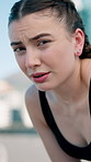 Fitness, tired and face of woman in city for exercise, cardio workout and training. Portrait, fitness and person with fatigue, sweat and breathe for active hobby, wellness and recovery in town