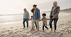 Holding hands, walk and love with big family at beach for support, summer vacation and bonding. Travel holiday, connection and grandparents with parents and children outdoor for generations and care