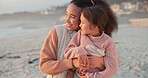 Relax, hug and mother with daughter at beach for love, bonding and family holiday. Connection, love and happiness with parent and child outdoor for summer vacation, travel and weekend break together
