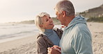 Love, dance and support with old couple at beach for travel, summer vacation and anniversary getaway. Holding hands, smile and retirement with senior people outdoor for holiday, bonding and romance