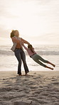 Ocean, spin and mother with girl, smile and bonding together for love, holiday and funny. Beach, family or mama with daughter, happy people or tropical island for summer vacation, laughing or playing