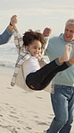 Beach, holding hands or swing child with grandfather, care or play with foster boy on holiday. Grandpa, kid or walk with parent by sea for game, smile or adoption with family generations for support