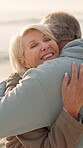 Outdoor, hug and senior couple with smile for bonding, travel holiday and tourism for anniversary trip. Romance, affection and old people with embrace for support, connection and vacation in nature