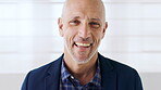 Face, laughing and mature business man on wall background for corporate development or management. Confidence, experience and professional with funny manager in workplace office for career or job