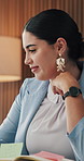 Planning, reading and smile of business woman at desk in office for online report or research. Computer, information and schedule with happy employee person in corporate workplace for review