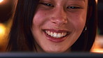 Night, woman and watching movie in home with tech, laugh and comedy for online entertainment on weekend. Late, female person and smile in apartment with streaming service, funny film and comic show.