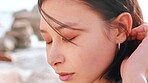 Breathe, thinking and woman on beach outdoor for summer idea, planning or vacation memory. Female person, travel or wind for reflection, calm morning and weekend break or holiday getaway in Miami