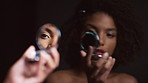 Beauty, checking and mirror with woman in studio for cosmetics or dermatology results. Aesthetic, reflection and skincare routine with person on dark background for cosmetology or facial inspection