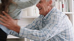 Senior man, kid and jumping at house with energy, playful fun and bonding together. Smile, grandfather and catching child with support, visit grandparent and babysitting grandchild for weekend break