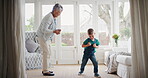 Dance, happy and grandmother with kid in home with music for bonding, fun or connection together. Smile, energy and senior woman with boy child for groove to radio in living room at apartment.