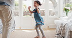 Dance, smile and grandmother with kid in home with music for bonding, fun or connection together. Happy, spinning and senior woman with girl child for groove to radio in living room at house.