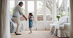 Dance, energy and grandmother with kid in home with music for bonding, fun or connection together. Smile, support and senior woman with girl child for groove to radio in living room at apartment.