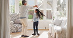 Dance, spinning and grandmother with kid in home with music for bonding, fun or connection together. Smile, happy and senior woman with girl child for groove to radio in living room at house.