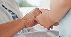 Holding hands, support and child with grandparent on sofa for love, home and bonding together. Family, care and person with kid in living room for empathy, connection and security in relationship