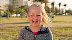 Laugh, nature and portrait of kid outdoor on vacation, getaway or weekend trip in summer. Smile, confident and girl child in park for holiday with growth, development or positive attitude in London.
