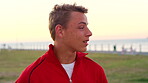 Beach, teenager and boy thinking on holiday, remember positive memory and view location for inspiration. Outdoor, space and calm person with reflection for vacation, nostalgia mindset and sightseeing