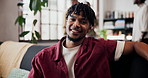 Smile, relax and face of man on sofa in home for weekend, holiday and afternoon break. Happy, confidence and portrait of person on couch with vacation, positive attitude and pride in living room
