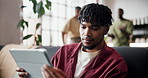 Tablet, shake head and man in home, frustrated for online gambling and error 404 for website. Apartment, tech and person on couch, rejection or email for loss on bet, network or fail on competition