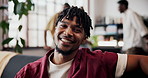 Confidence, relax and face of man on sofa in home for weekend, holiday and afternoon break. Happy, smile and portrait of person on couch with vacation, positive attitude and pride in living room