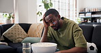 Frustrated, sad or black man watching tv in lounge, sports competition or upset for soccer game results. Live streaming, football fan or disappointed for tournament loss in home, flag or team failure