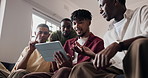 Break, speaking and tablet with friends on sofa in living room of home for bonding or conversation. App, streaming and talking with group of happy people in apartment together for discussion