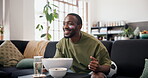 Victory, snacks and black man in home with soccer game, goal excitement or celebration in sports tournament. Watching, cheer or football fan with popcorn, score lead or winning shout in Los Angeles.