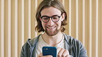 Reading, scroll and man with phone in creative agency, check project deadline and digital work newsletter. Review calendar, email and person with mobile for message on staff bulletin, smile and app