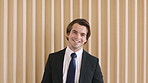 Happy, wall and face of businessman in office with confidence for finance career with growth. Smile, professional and portrait of male financial manager with pride for company about us in workplace.