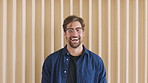 Face, business and man in workplace, funny and writer for creative agency, laughing and about us. Employee, person and journalist in office, happiness and copywriting for proposal, smile or humor