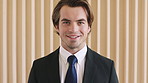 Smile, wall and face of businessman in office with confidence for finance career with growth. Happy, professional and portrait of male financial manager with pride for company about us in workplace.