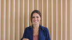 Face, confident and business woman in office, creative copywriter and person with opportunity. Portrait, smile and  professional with pride, employee or content writer with space in workplace in USA